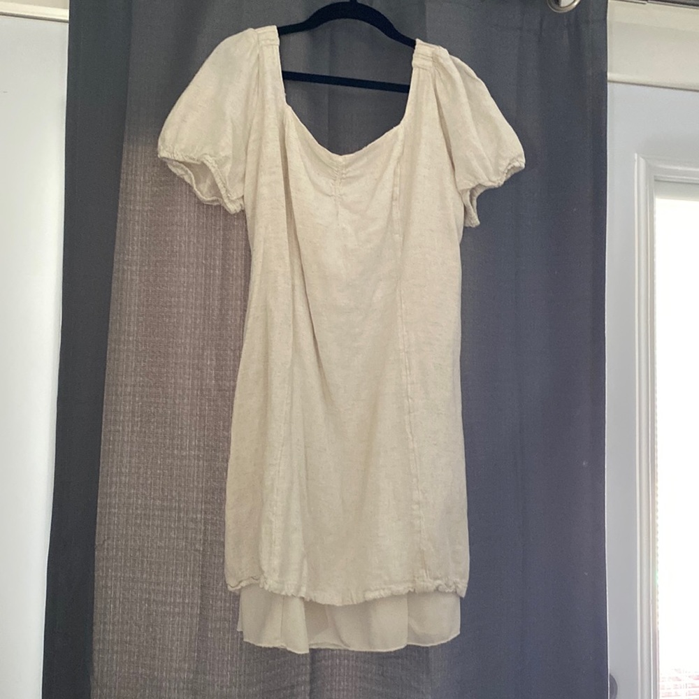 Cream dress. Only worn once. No blemishes or stains.